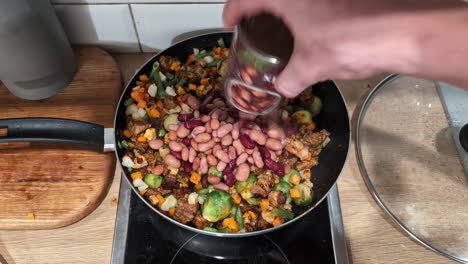 Close-up-shot-of-popular-Mexican-dish-of-meat-and-vegetables,-cut-into-pieces-and-cooked-in-a-kitchen