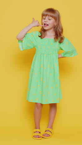 child girl kid doing phone gesture like says hey you call me back advertising proposition vertical