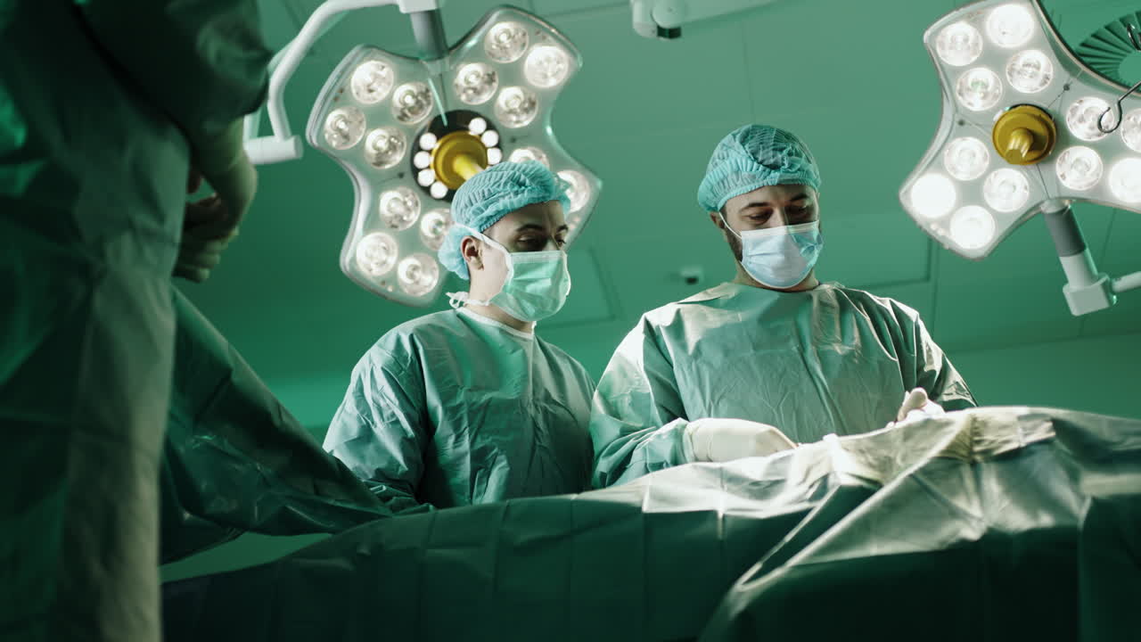 Surgeons performing an operation in the operating room