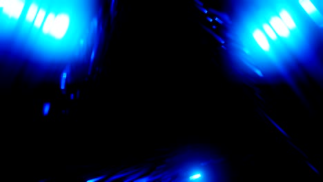 vuelo a través de un túnel de triángulo azul abstract colorido. futuro, velocidad, animación de grandes datos. renderización en 3d