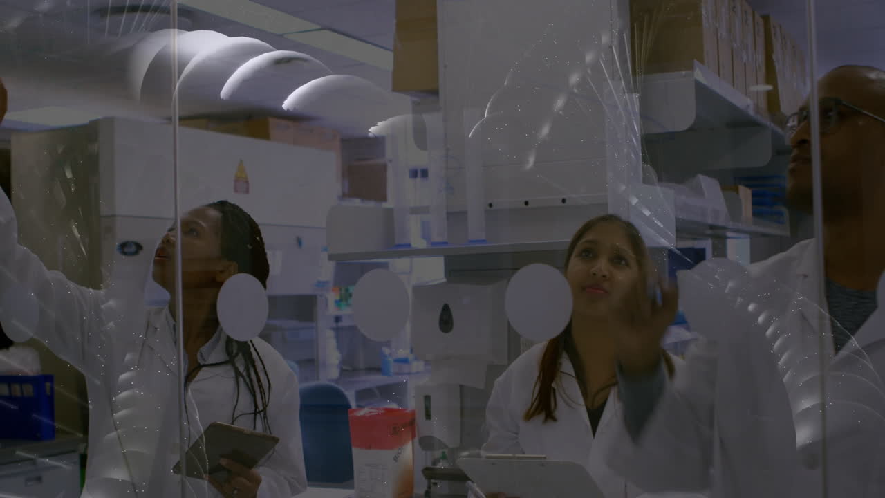 Scientists in lab coats working with data processing animation over laboratory scene