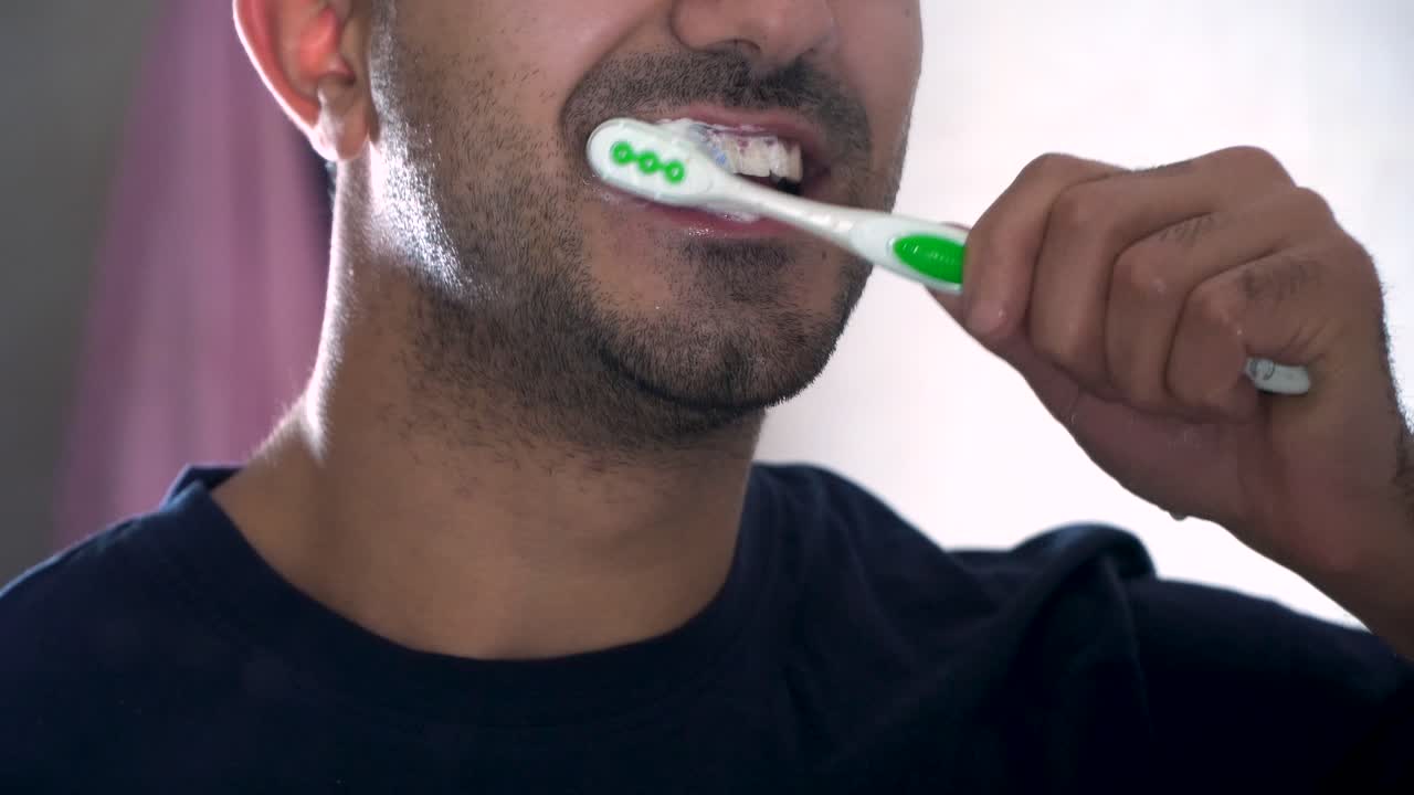 Man brushing his teeth