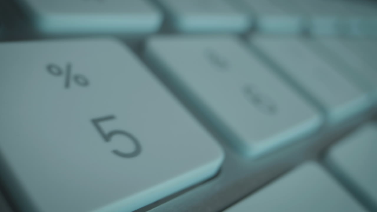 Flight over huge keys of computer keyboard