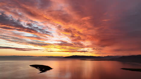 calm flat sea with beautiful sunset in iceland reykjavik