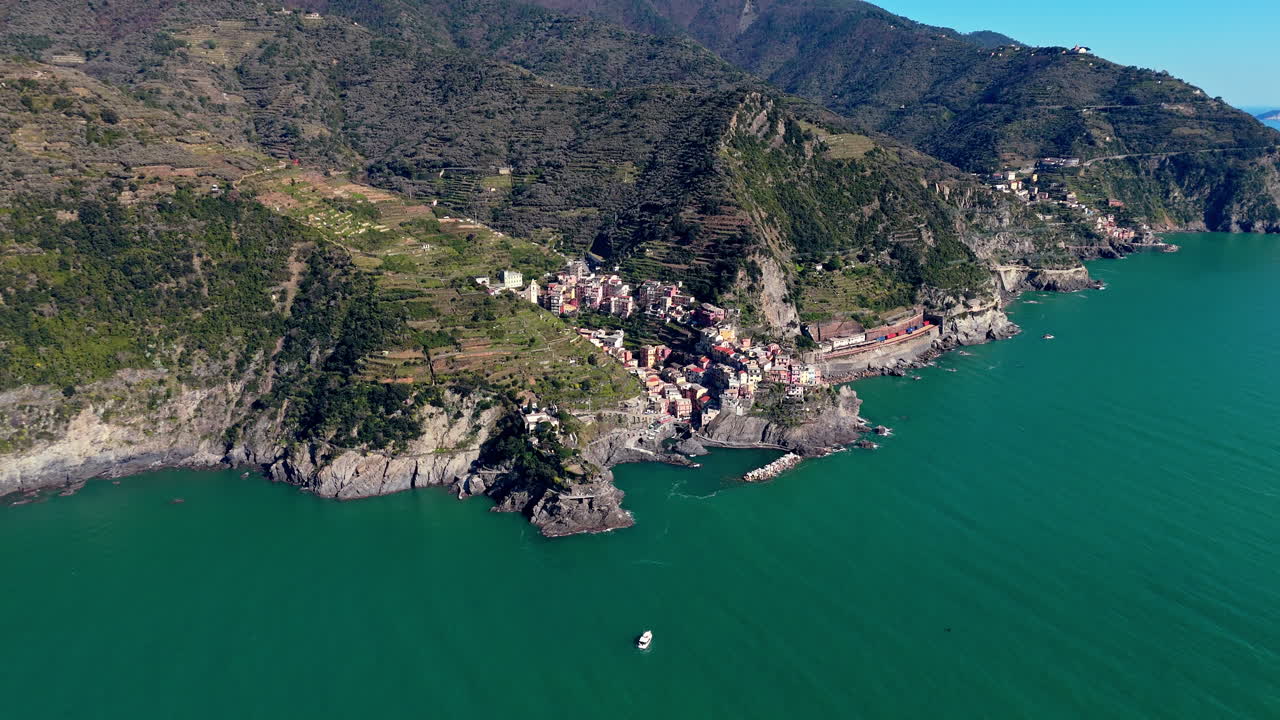 Coastal view of Manarola, Cinque Terre, Italy, showcasing a scenic village by the sea