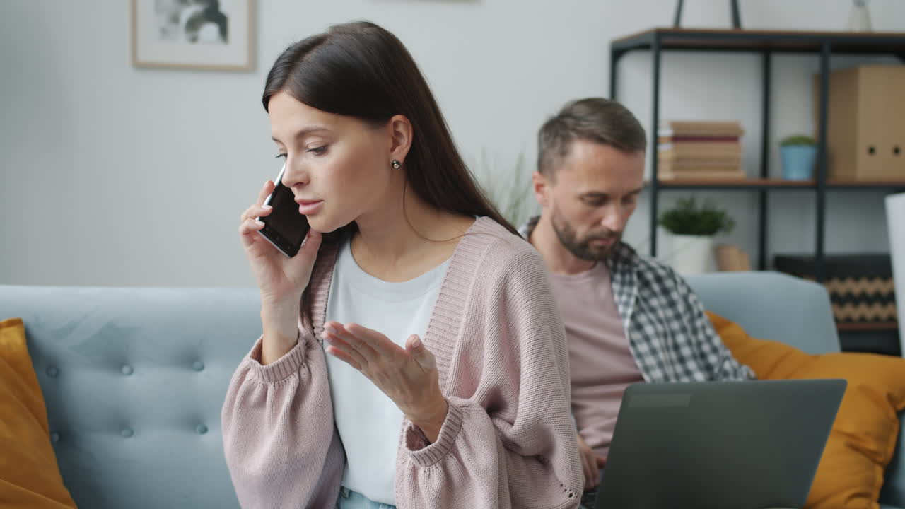 Couple Arguing Over Phone Call at Home