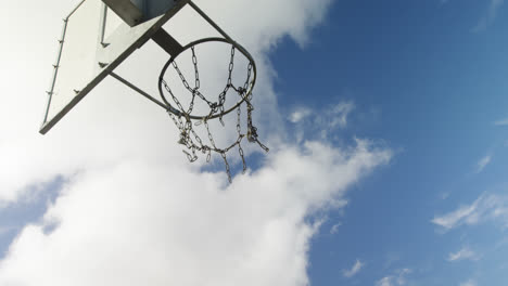 basketball player scoring a dunk