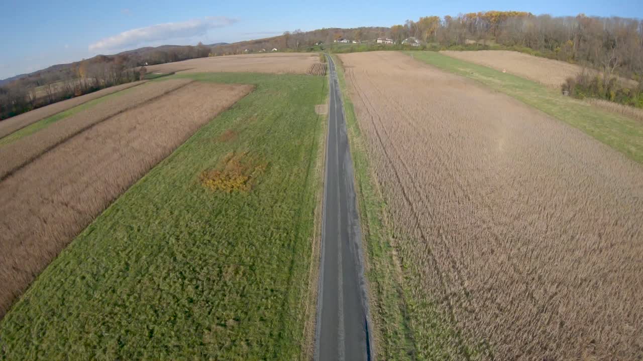 4k drone shot of a road in rural Pennsylvania.