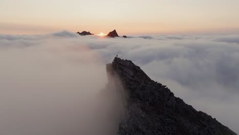 Aerial-view-of-Segla-mountain-above-the-sky,-Norway-during-summer