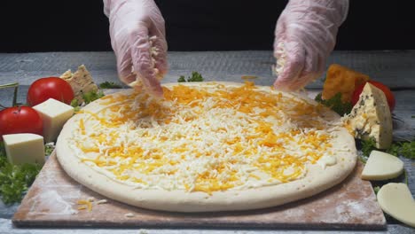 chef making a pizza with cheese