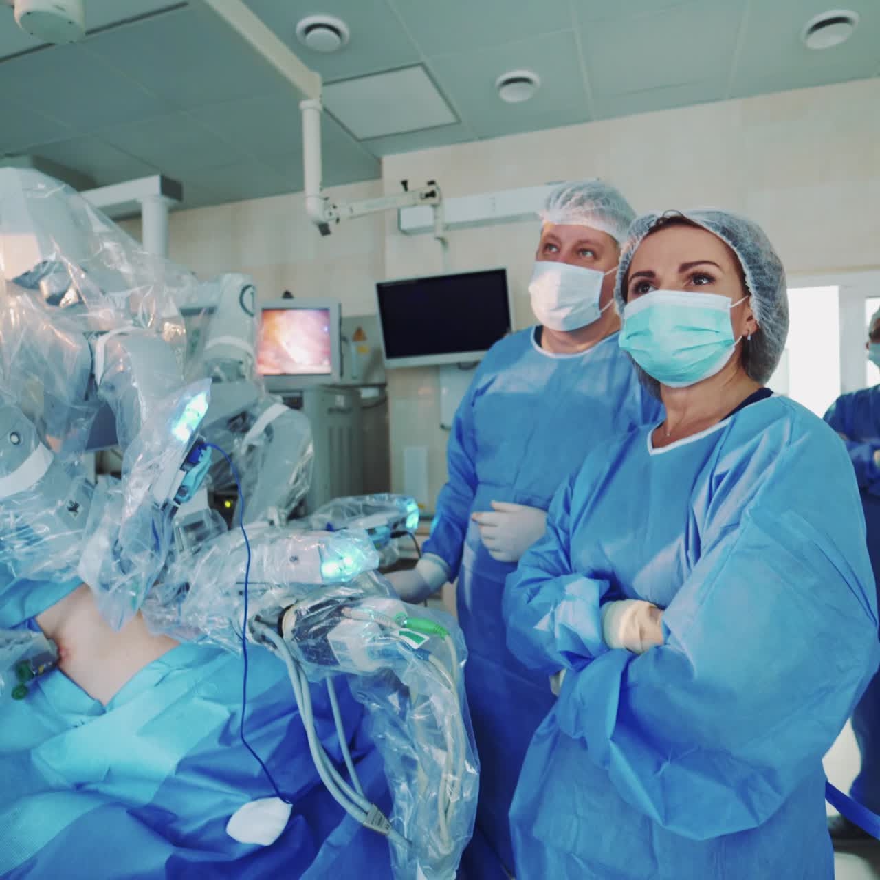 Modern surgical robot in clinic. Doctors perform minimally invasive surgery using a robotic device. New technologies in medicine.