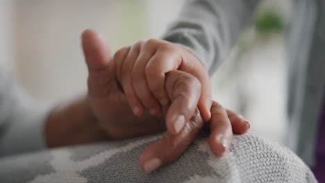 little-girl-holding-hands-with-grandmother-child-showing-compassion-for-granny-enjoying-love-from-granddaughter-family-support-concept-unrecognizable-people-4k