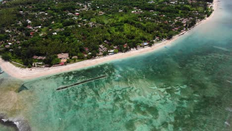 Aerial-view-of-the-coastline-with-a-breakwater