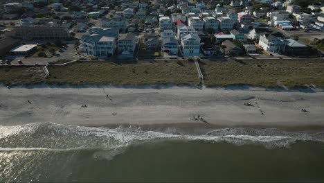 aerial flight over kure beach towards housing northern california