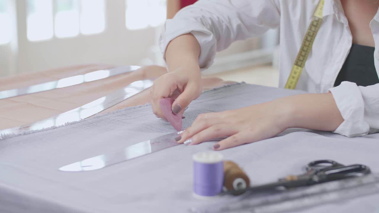 Hand Female Fashion, Designer, Draws On A Piece Of Fabrics