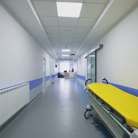 corridor in hospital with beds. hospital empty corridor, healthcare during corona virus covid 19 epidemic
