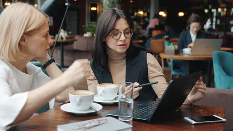 businesswomen meeting in a coffee shop