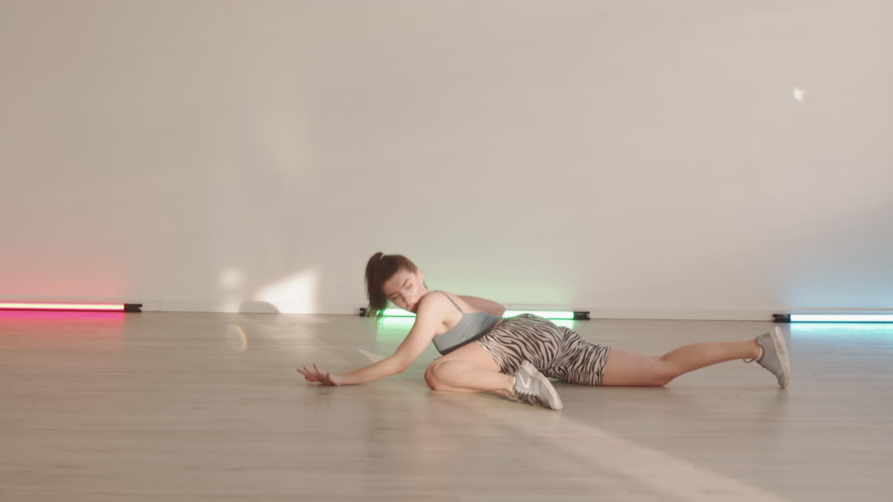 Flexible Woman Twerking on Floor