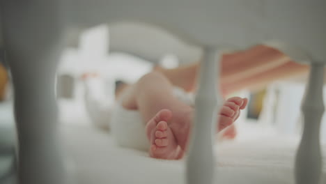 baby feet in a crib