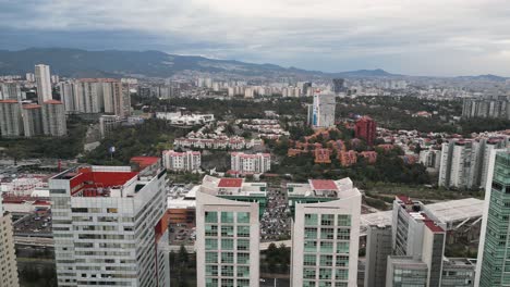 Stunning-aerial-view-of-Santa-Fe-business-districts,-Cuajimalpa,-Mexico-City