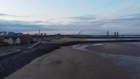 Rising-Aerial-View-of-Port-Talbot-with-Seafront-and-Steelworks