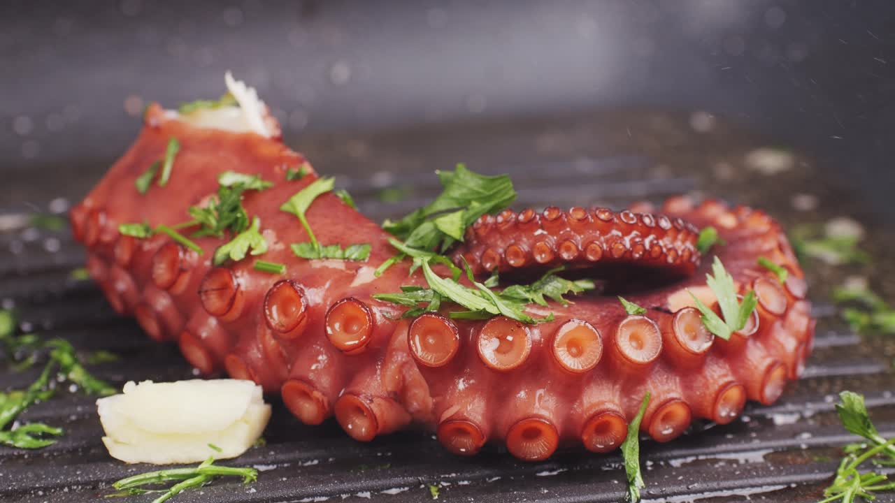 Octopus cooking, chef grill fresh octopus galician style on restaurant kitchen, healthy food, seafood cafe in spain, traditional asian japanese spanish and mediterranean dish.