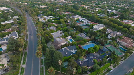 aerial shot of beverly hills, drone flying over residential neighborhood in famous california city