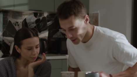 couple enjoying coffee at home