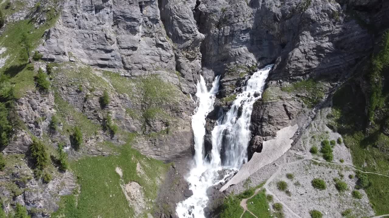 waterfall above the lac de tseuzier in valais in switzerland