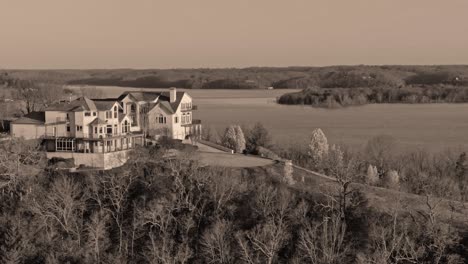 monochrome cinemagraphic of executive lake homes over looking the lake