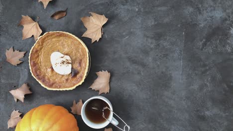 4k pumpkin pie flat lay and lights twinkling.