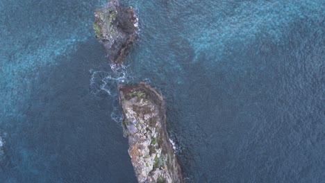 aerial view over rock needle in atlantic ocean, madeira island