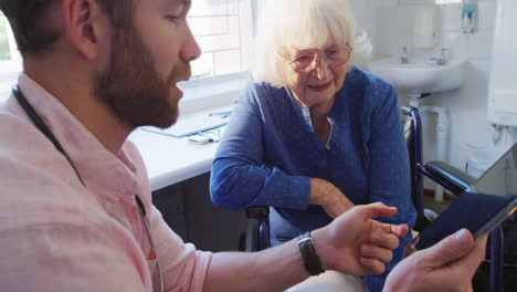 Doctor-examining-a-senior-woman-in-a-retirement-home