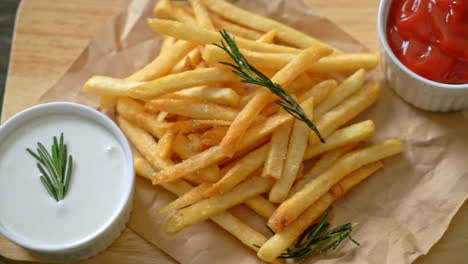 French-fries-or-potato-chips-with-sour-cream-and-ketchup