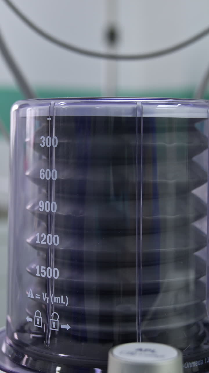 Ventilator pump working in the surgery room. Close up. Equipment in modern clinics. Blurred backdrop. Vertical video