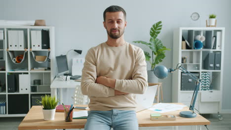 man sitting at a desk in an office