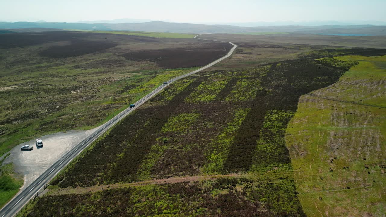 The A543 on the legendary Evo Triangle, Denbigh Moors, Wales - one of the best driving roads in the world - Aerial drone flyover on a summer&rsquo;s afternoon
