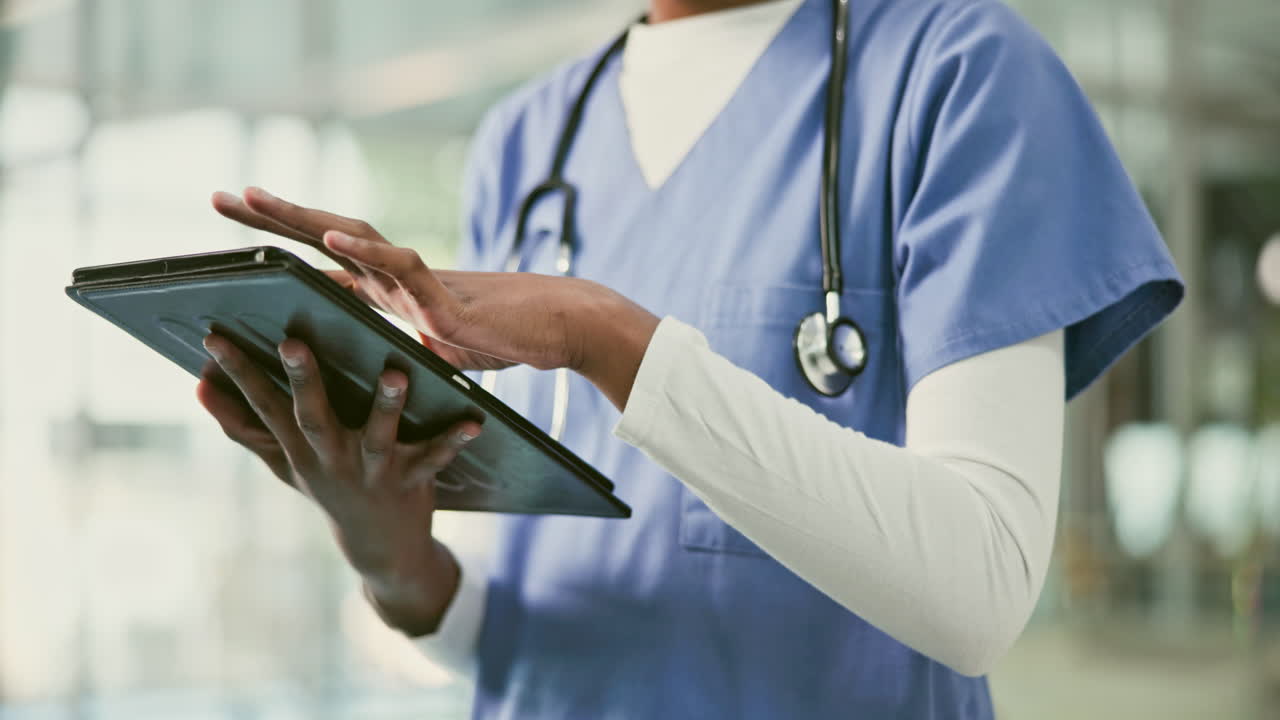 Doctor using a tablet in a hospital