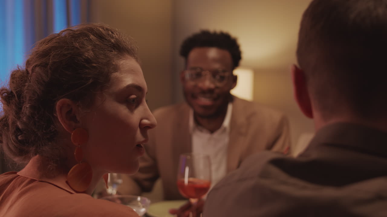 Beautiful Woman at Festive Dinner with Friends