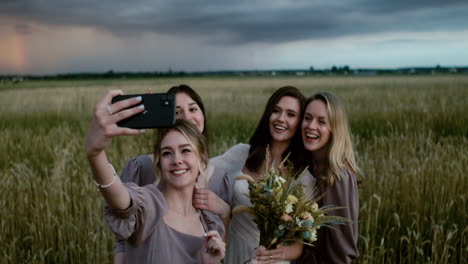 bride posing with her bridesmaids