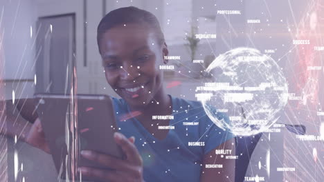 animation of network of digital icons and spinning globe over woman using tablet