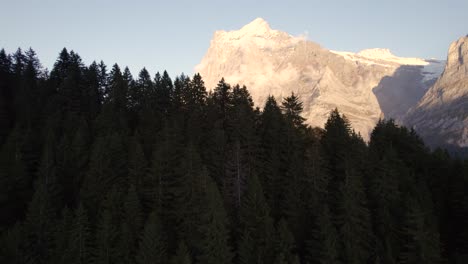 aerial-drone-footage-rising-up-revealing-majestic-views-of-mount-Wetterhorn-in-Grindelwald-in-Swiss-Alps