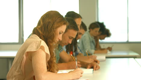 students taking notes in lecture