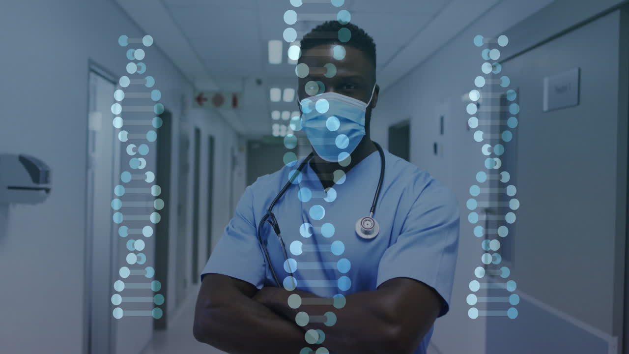 Animation of dna strands over biracial male doctor with face mask