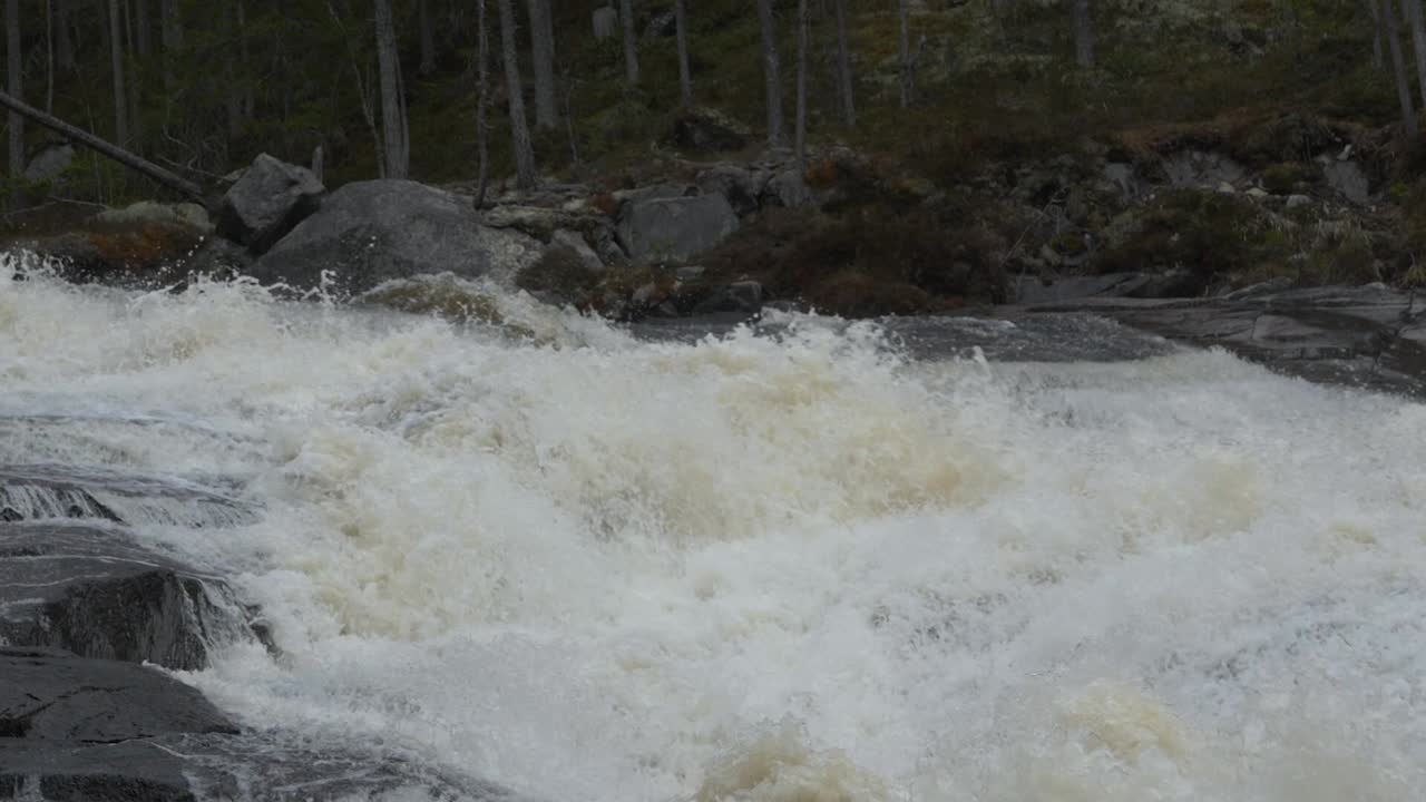 Crazy waterfall-river in Norway. Slowmotio