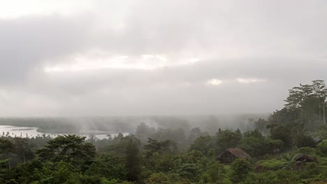 Fog-rolling-through-an-indigenous-village---Wide-shot