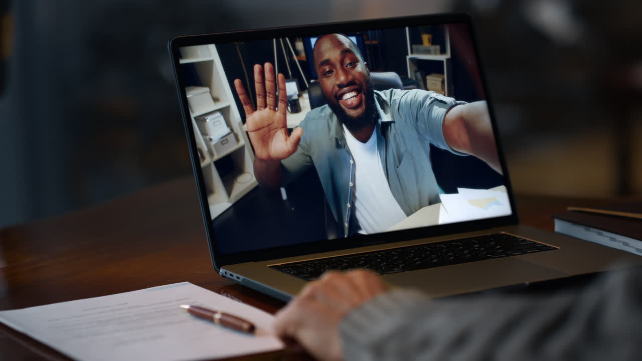Man having a video call on a laptop