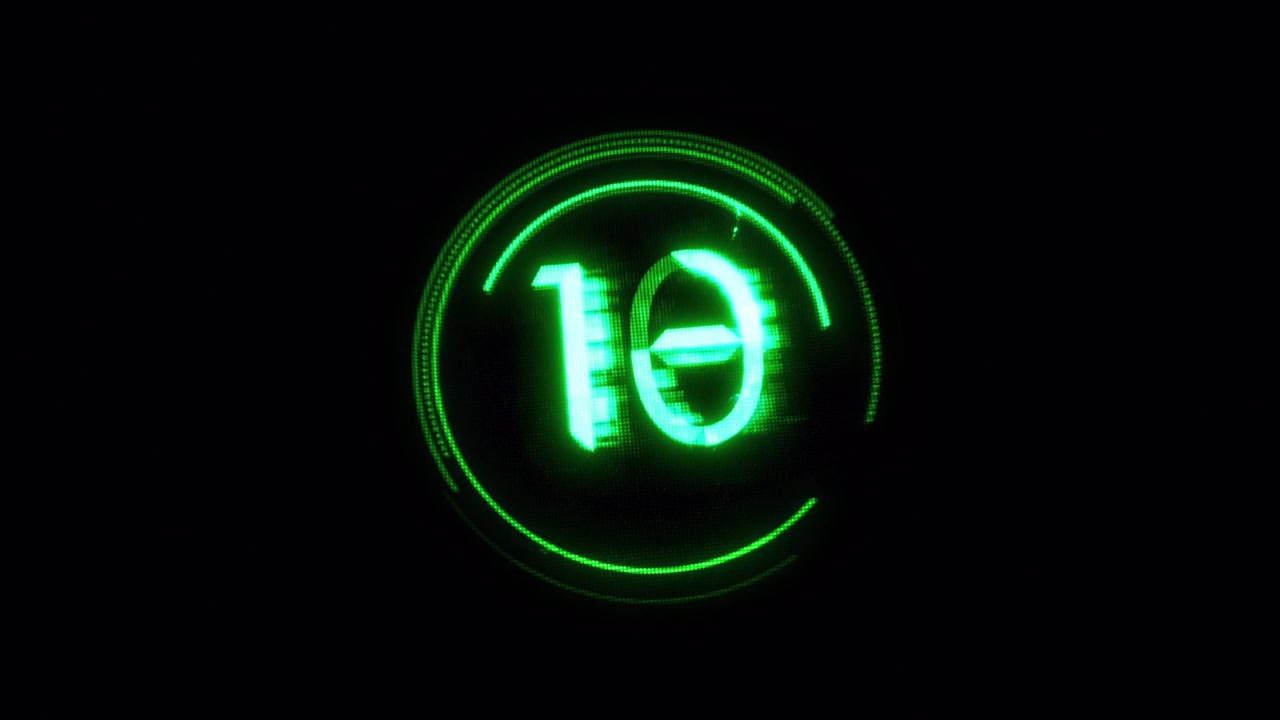 Digital Countdown Timer with Glitch Effect on Black Background