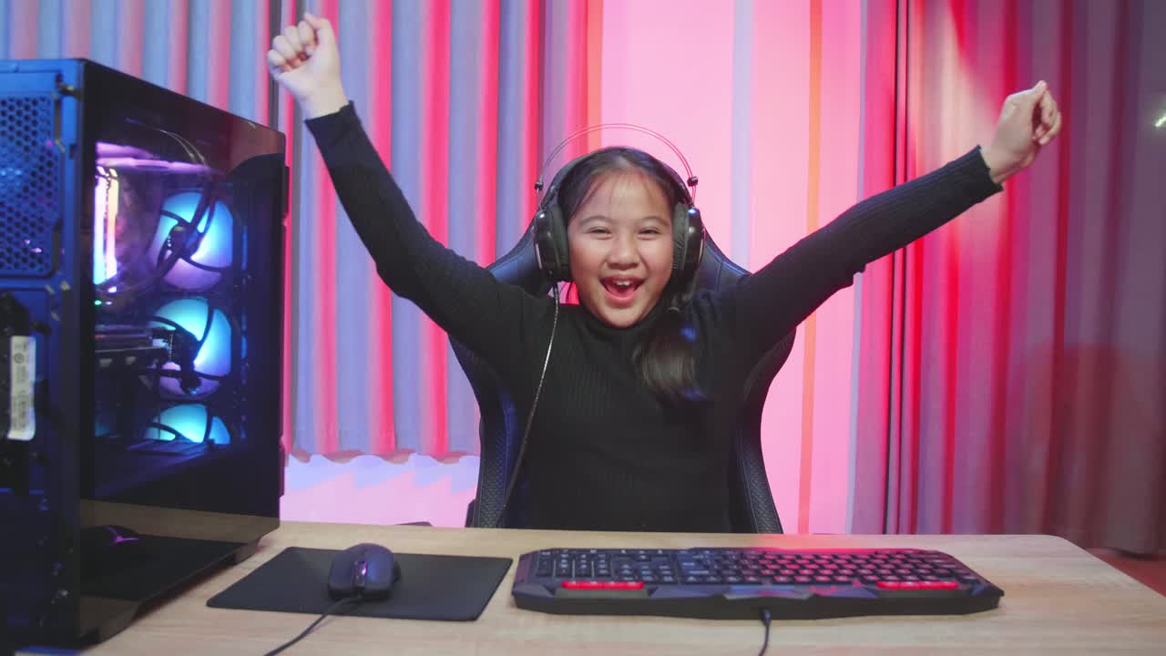 Asian Young Woman Controlling Console With Mouse And Keyboard Win Video Game