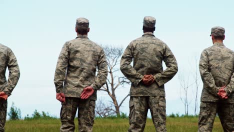 group of military soldiers standing in line 4k